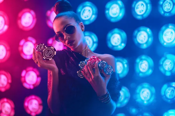 A man focused on his laptop with live stats in the background, highlighting the dedicated sports and gaming features of the JDLOVE mobile app.