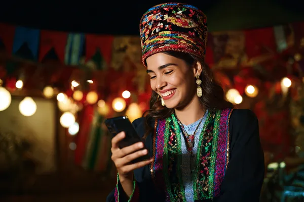 A confident dealer surrounded by casino chips inviting players to access their JDLOVE account, reflecting quick and easy login options.